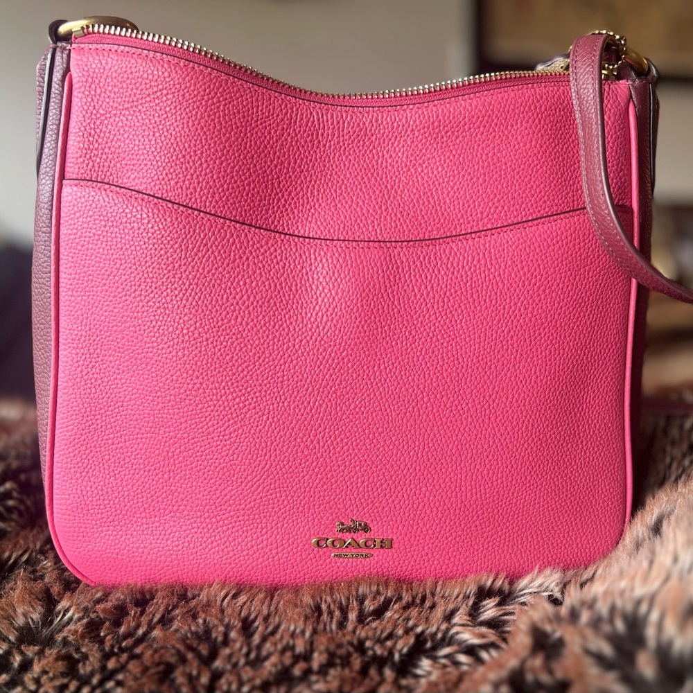 Coach Crossbody. Pink and in perfect condition with dust bag.